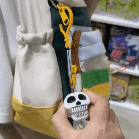 Skelvix™ – Hanging Skeleton Keychain With Movable Body Design